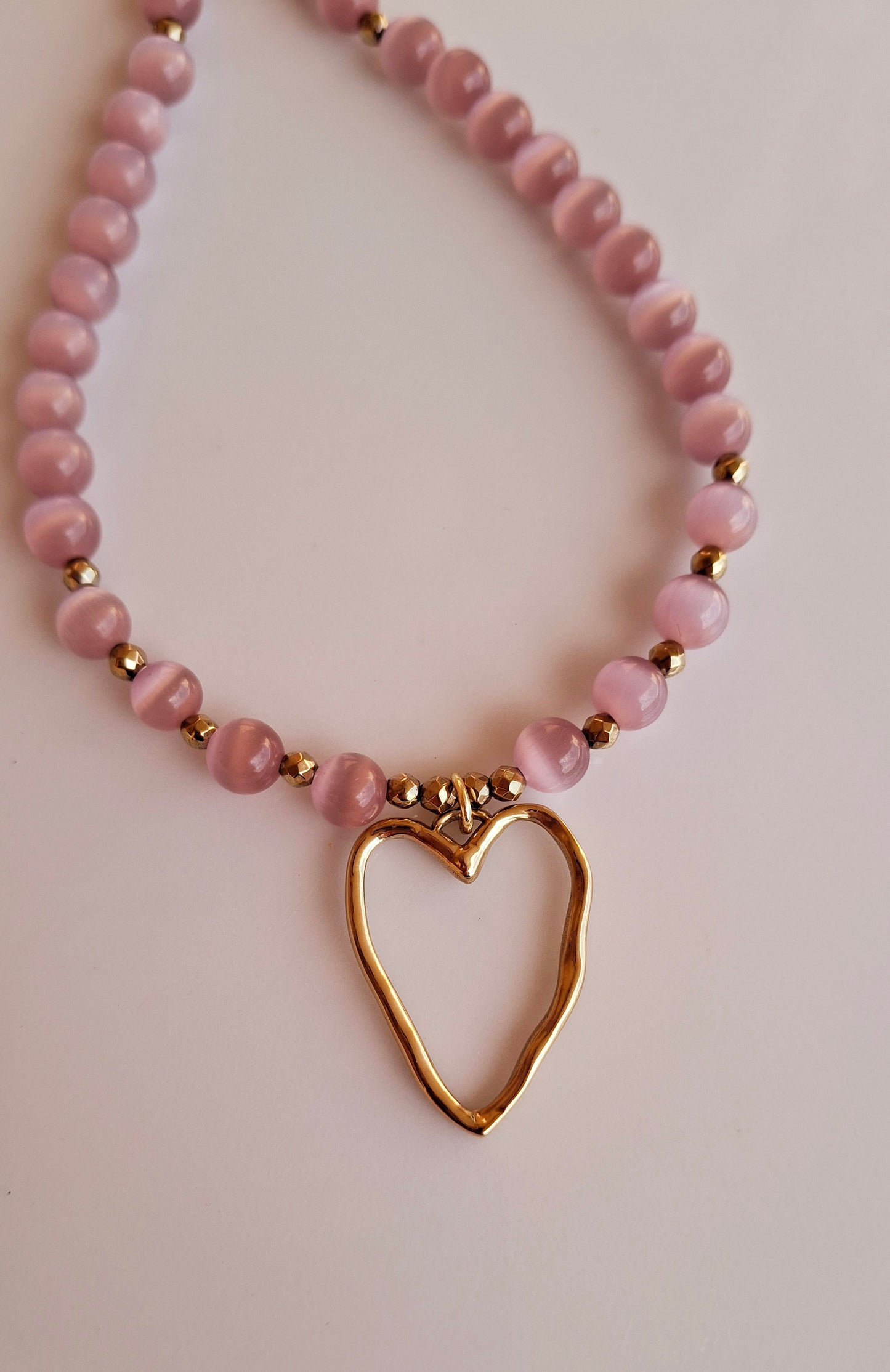 Collana con pietra occhio di gatto e cuore