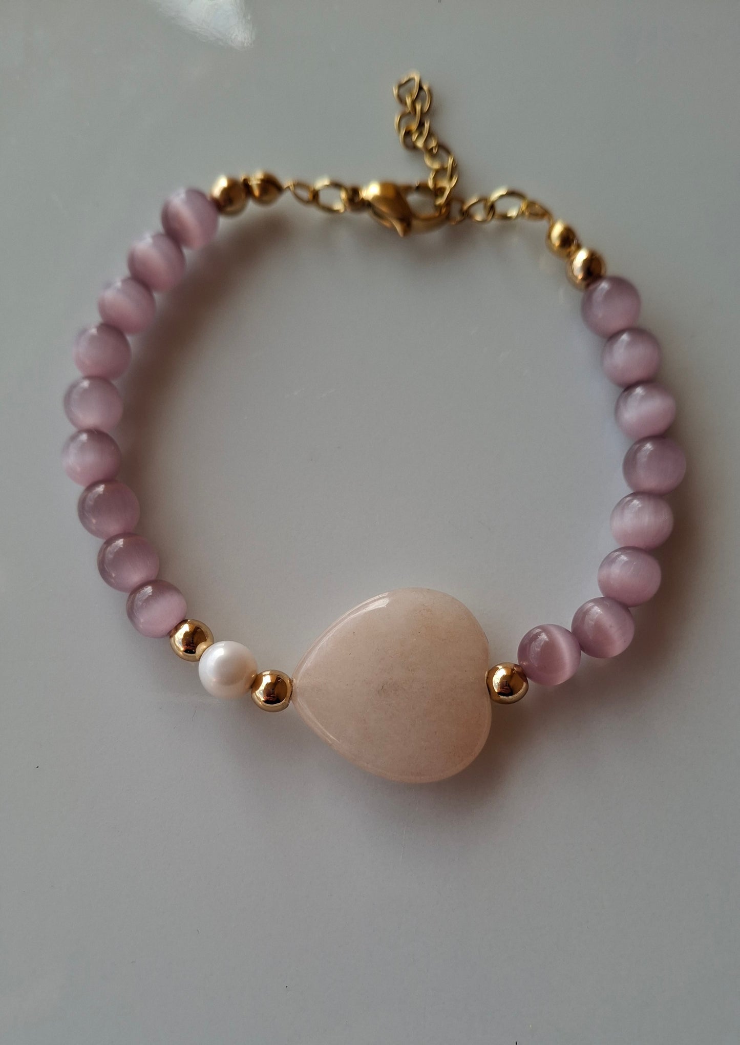 Bracciale pietra occhio di gatto, con perla e giada