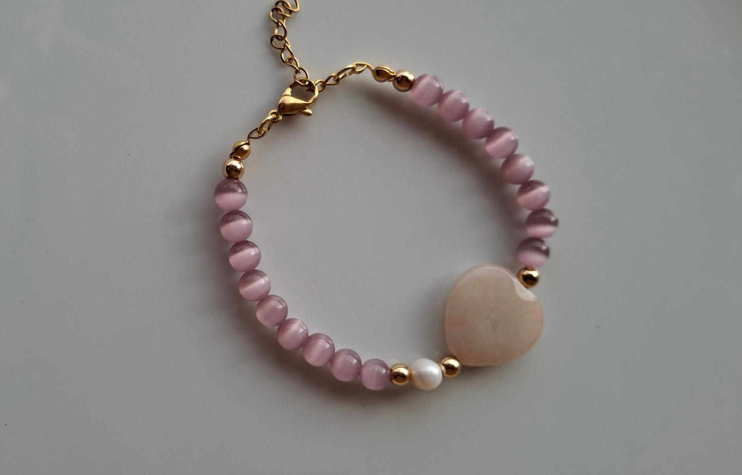 Bracciale pietra occhio di gatto, con perla e giada