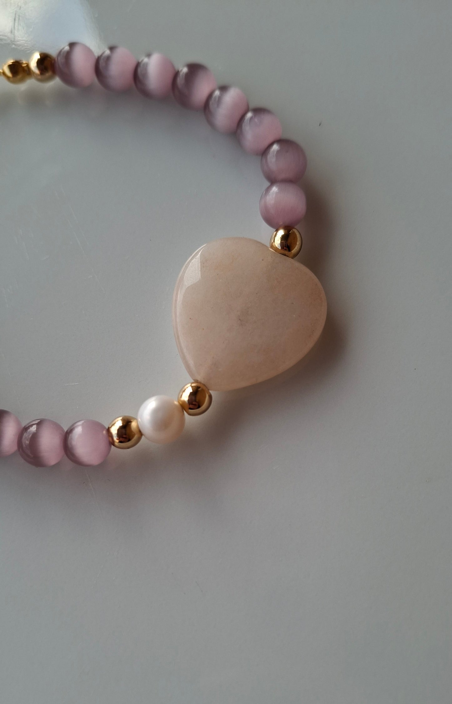 Bracciale pietra occhio di gatto, con perla e giada